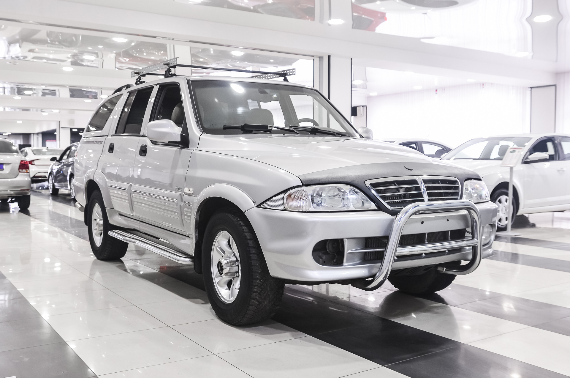 Купить БУ SsangYong Musso 2006 года выпуска с пробегом 76 699 км в Москве,  продажа б/у SsangYong Musso (Белый) — Автосалон Trade Profi