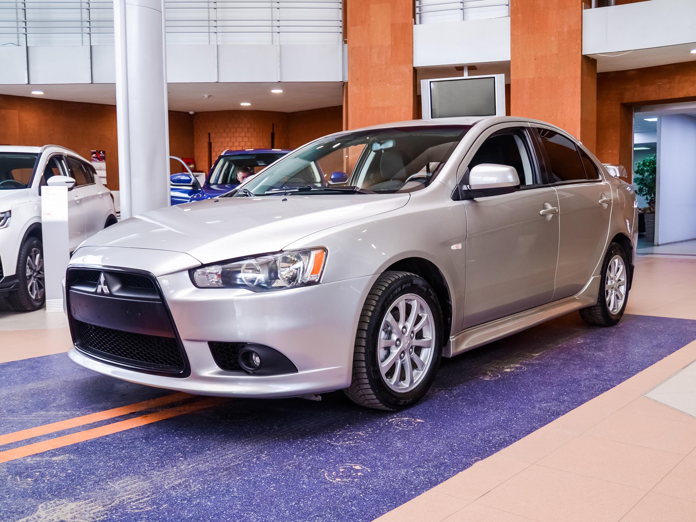 Митсубиси лансер 2012 года. Lancer 10 2.0. Mitsubishi Lancer Ralliart 2008. Mitsubishi Lancer 10 кузов. Митсубиси Лансер 2.0.