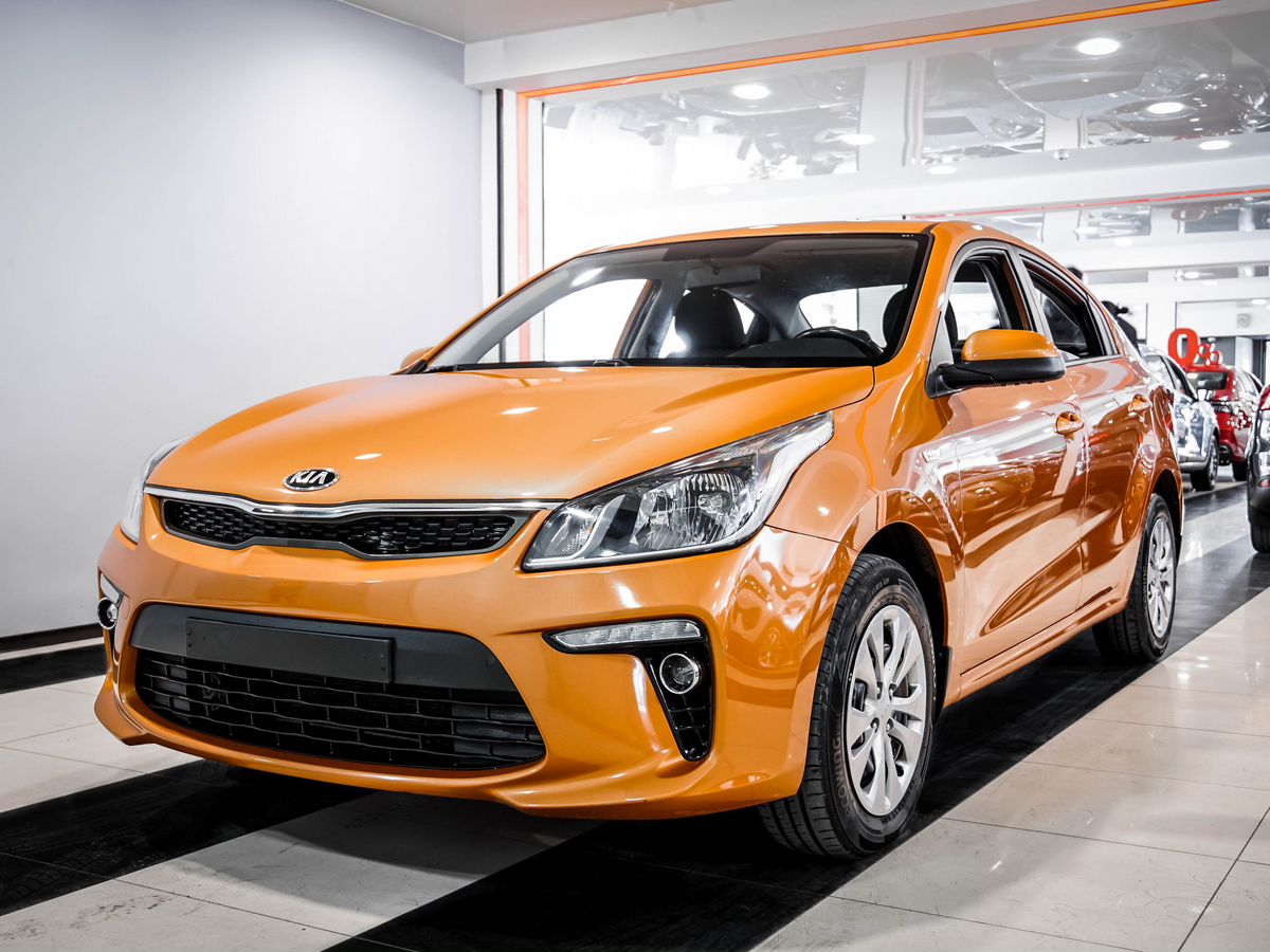 Купить БУ Kia Rio 2018 года выпуска с пробегом 64 873 км в Москве, продажа б/у  Кия Rio (оранжевый) — Автосалон Trade Profi