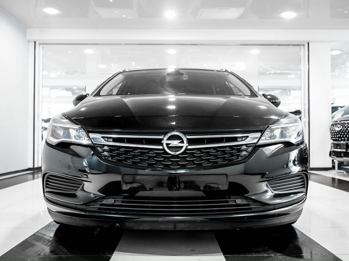 Купить БУ Opel Astra 2019 года выпуска с пробегом 111 850 км в Москве,  продажа б/у Опель Astra (черный) — Автосалон Trade Profi