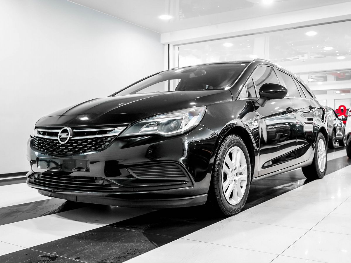 Купить БУ Opel Astra 2019 года выпуска с пробегом 111 850 км в Москве,  продажа б/у Опель Astra (черный) — Автосалон Trade Profi